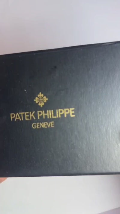 Patek Philippe Nautilus Black Dial Watch - Black Strap